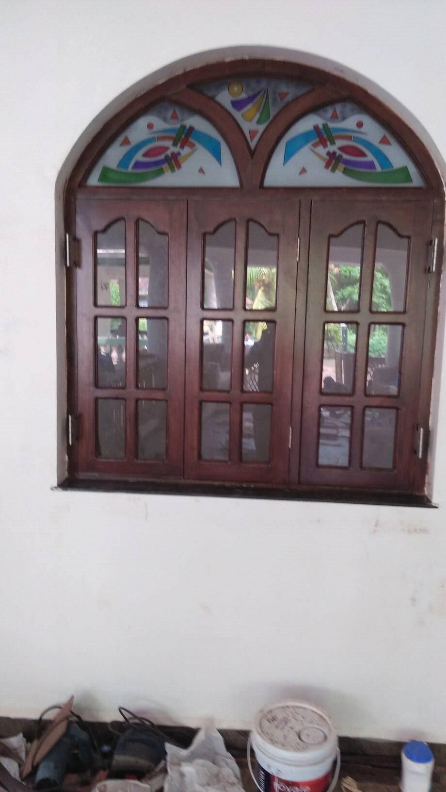 Arched Window Stained Glass — Carpentry